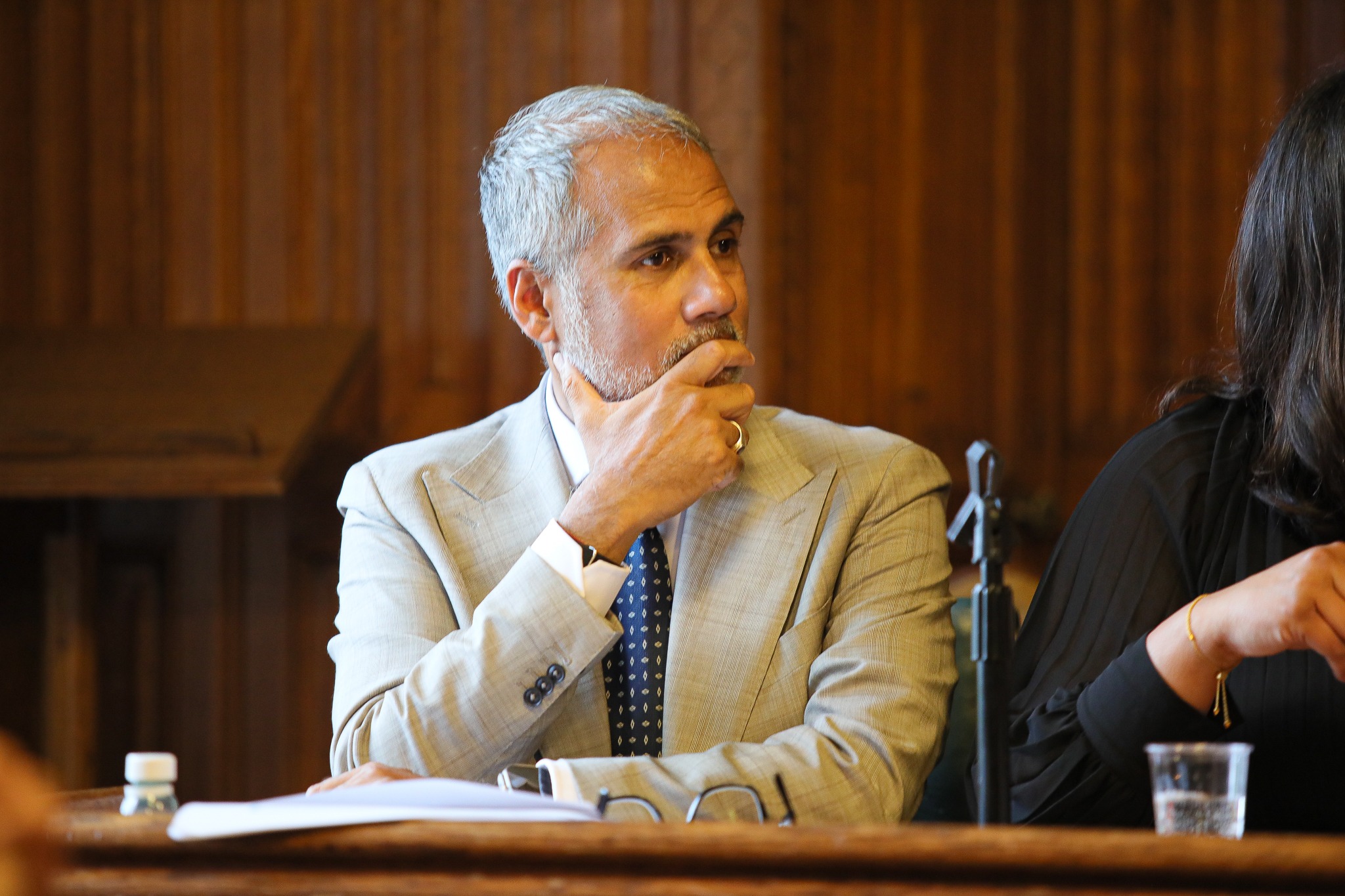Alpesh Patel listening during a panel discussion